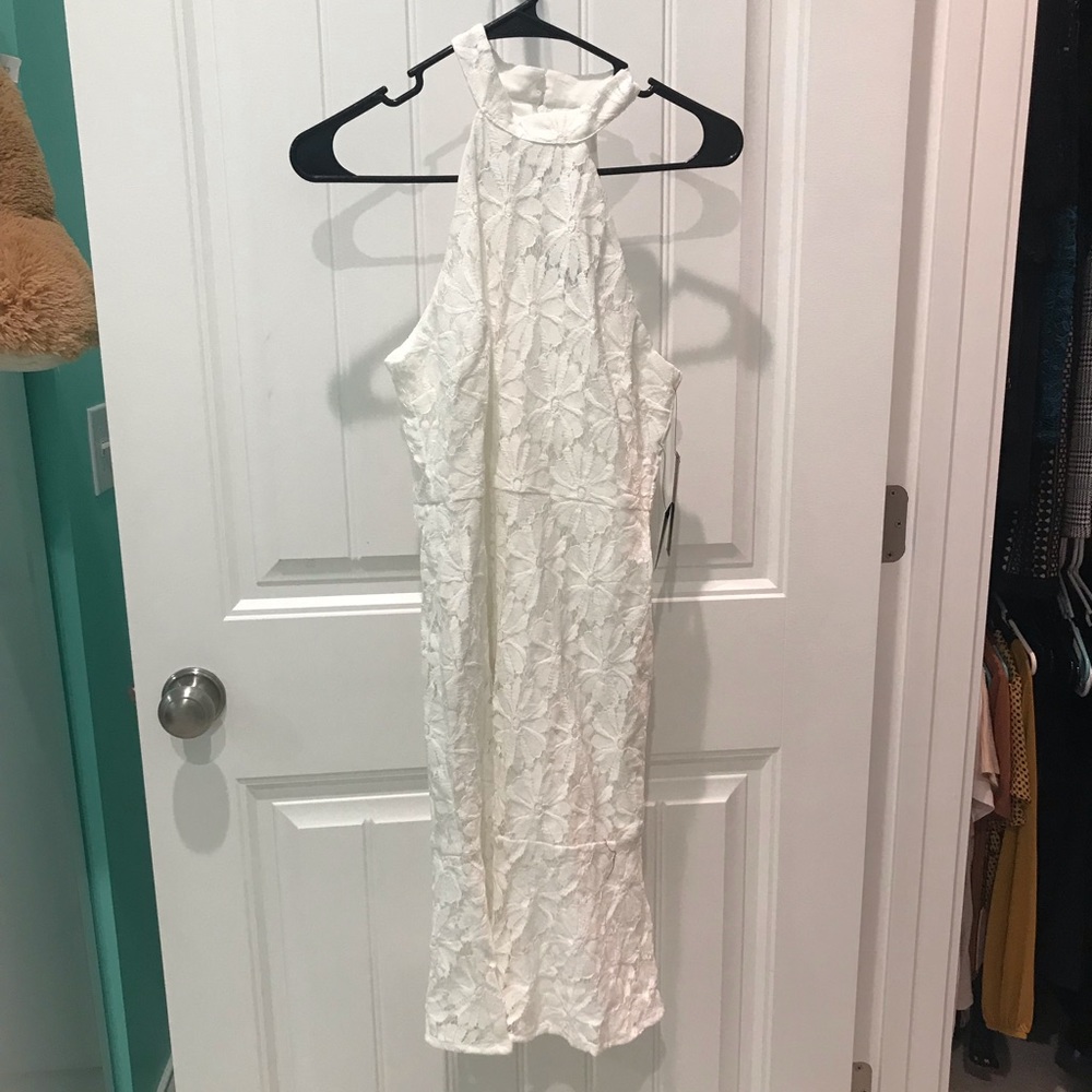 White trumpet halter top style dress